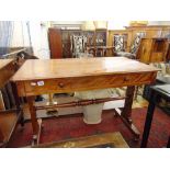 A Mahogany library stretcher table