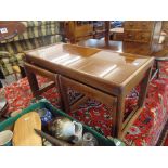 A Mid-century nest of three coffee tables