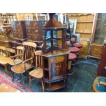 An inlaid Edwardian corner mirrored cabinet