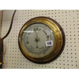 A brass and mahogany framed wall barometer