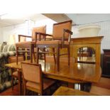 A Mid-century Scandinavian Teak extending dining table and eight chairs ( six chairs and two