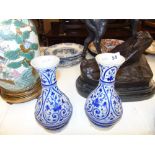 A pair of blue and white stoneware vases