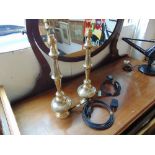 A pair of Indian brass table lamps,