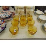 Eight Amber glass champagne coupes