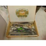 A collection of scissors, manicure tools etc.
