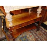 A late 19th century mahogany drop leaf table