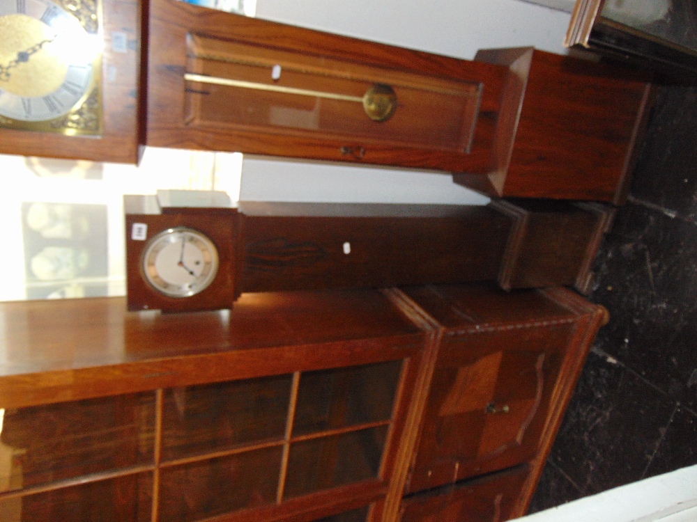 An Artdeco Oak Grandmother clock a.