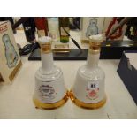 Two bottles of Bell's Whisky,
