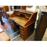 An Oak roll top desk