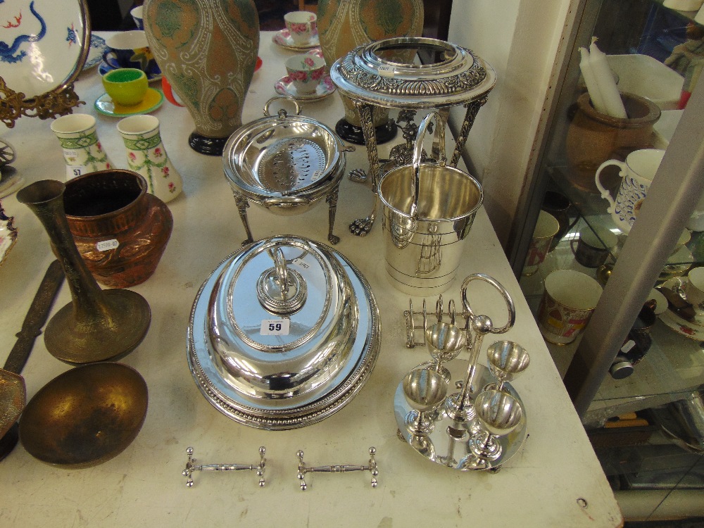 A collection of silver plate inc. cruet, ice bucket etc.