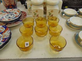 Eight Amber glass champagne coupes