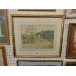 A framed watercolour, village cottage scene, signed,