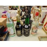 Four bottles of assorted alcohol; Cochburns Port,