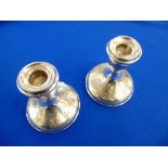 A pair of hallmarked Silver candlesticks