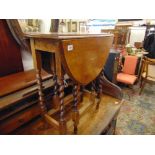 A small light Oak barley twist Gateleg table