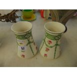 A pair of small Minton vases