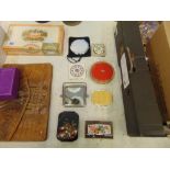 A collection of compacts, mirrors etc.