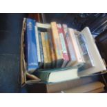 A box of assorted books