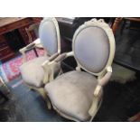 A pair of salon elbow chair