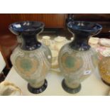 A pair of Royal Doulton Lambeth vases,