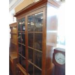 An Oak bookcase on base,
