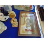 A small Coleman's mustard advertising mirror plus onyx table lighter