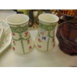 A pair of small Minton vases