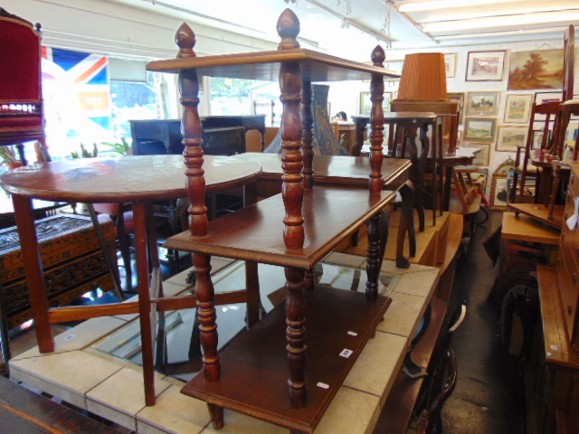 A three tier mahogany bookshelf