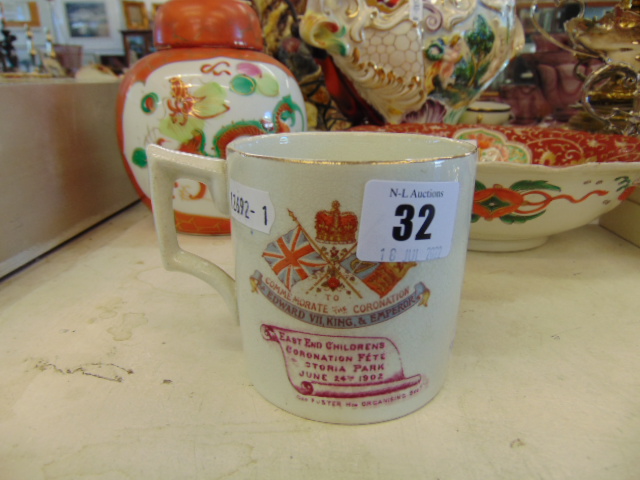 An Edward VII coronation mug,