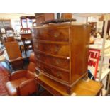 A Walnut bow front chest