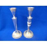 A pair of small Silver candlesticks, approx. 2.