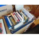 A box of assorted books