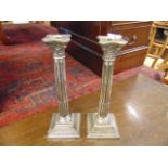 A pair of hallmarked Silver candlesticks,m approx.