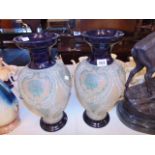 A pair of Royal Doulton Lambeth vases,