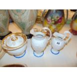 A qty of Meissen, two jugs and a lidded bowl, some wear a.