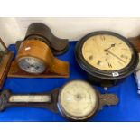 Two wall clocks and barometer a.