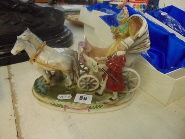 A Dresden carriage figural group