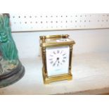 A brass carriage clock by Fisher and Co.