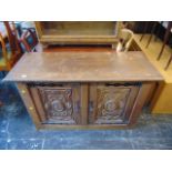 A French carved 2 door cabinet