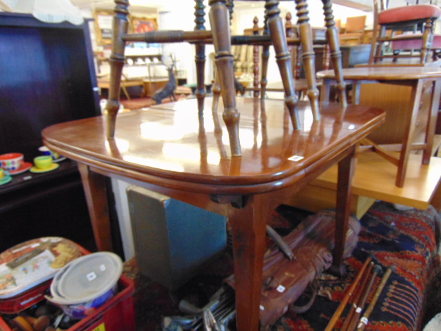 A Mahogany extending table