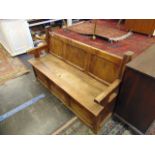 A three seater settle