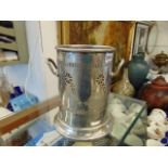 A hallmarked Silver wine holder,