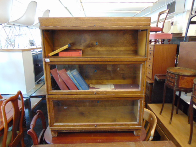 A three tier bookcase,