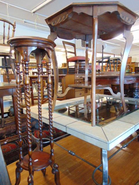 A Edwardian octagonal table and a barley twist plant stand