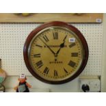 A Mahogany wall clock by Betsworth and Son,