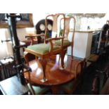 A Queen Ann style reproduction extending table, two leaves,