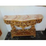 A Barocco style table with marble top