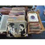 An assortment of LP's/ singles Beatles