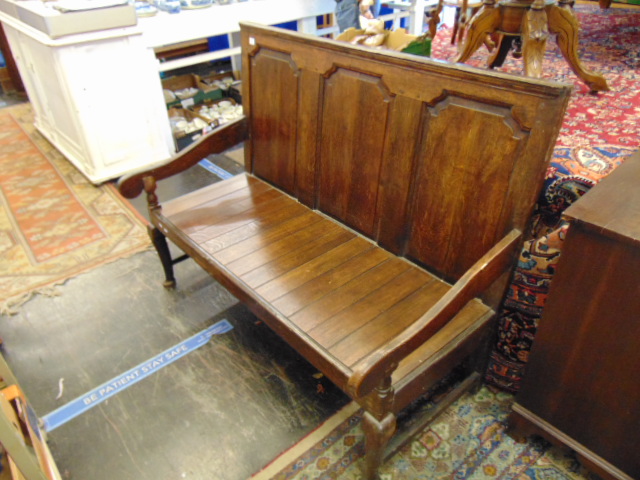 An 18th century Oak settle,