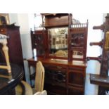 An Edwardian mirror top sideboard